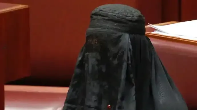 Australian Senator Pauline Hanson Sparks Uproar After Wearing Burqa in Parliament to Demand National Ban
