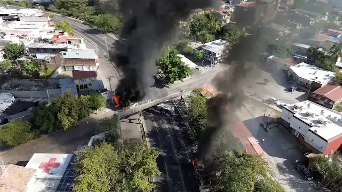 Mexico Erupts in Violence After El Mencho Killing; Roadblocks, Airport Panic