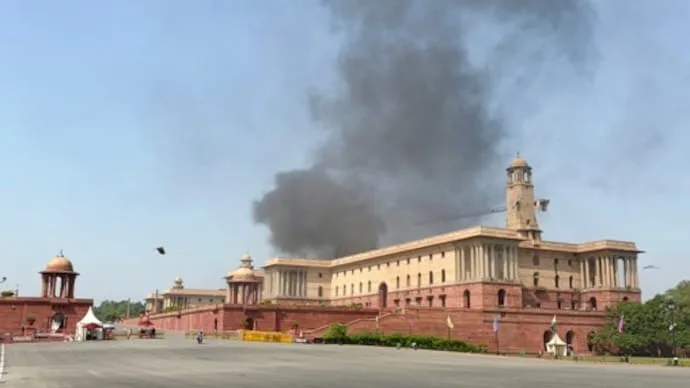 Smoke rises from North Block in New Delhi after a fire broke out in an old plastic water tank on the rooftop.