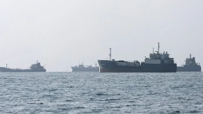 Vessels navigating the Strait of Hormuz near Bandar Abbas amid shipping disruption and international concerns over maritime access.