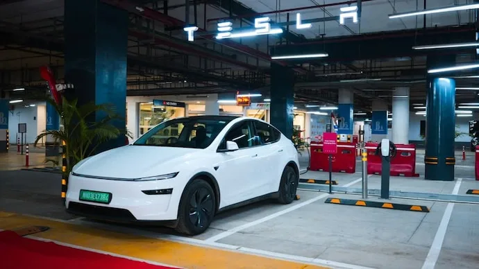 Tesla Model Y electric car representing the company's growing vehicle sales and operations in India.