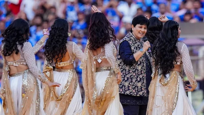 Falguni Pathak performing live at a Garba celebration, continuing her decades-long association with Navratri.