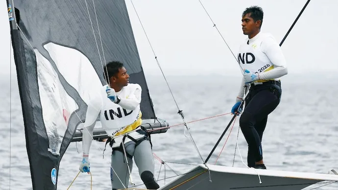 Manu Francis and Prince Noble Kurisinkal celebrate their Asian Games sailing silver