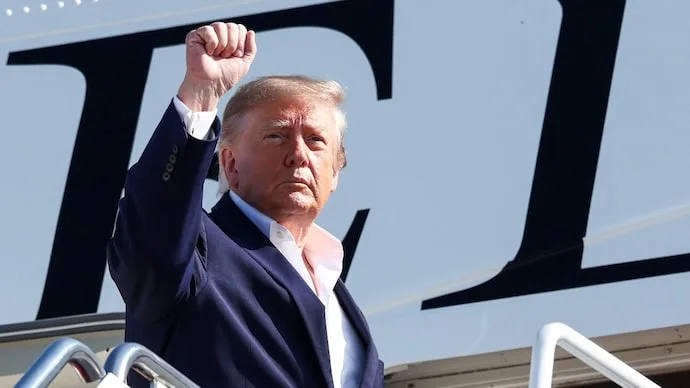 US President Donald Trump speaks before boarding Air Force One ahead of a campaign trip to Texas before the 2026 US midterm elections.
