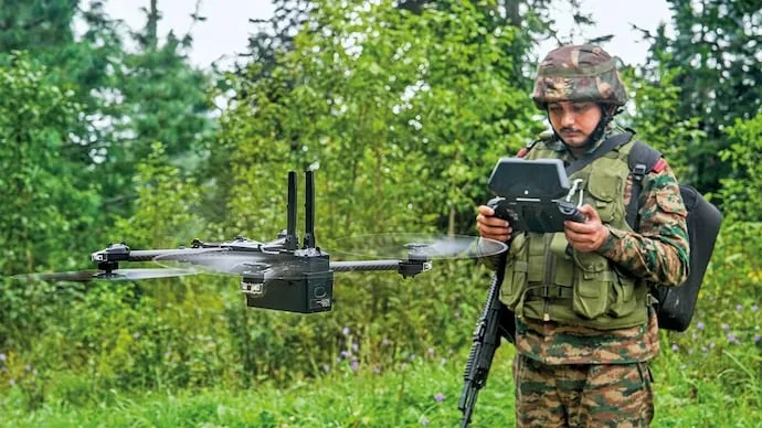 Indian Army soldier operating a military drone near the Line of Control in Kashmir.