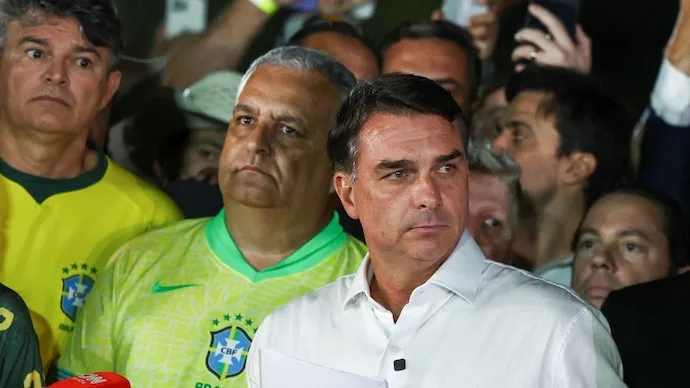 Flavio Bolsonaro speaks after Brazil’s presidential election as his departure for the United States draws criticism from Lula.