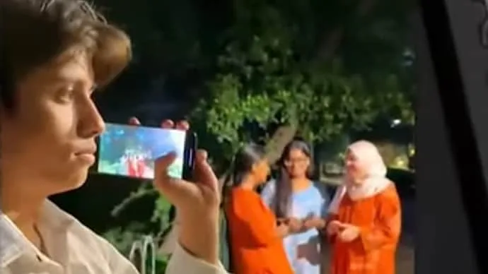 Indian Youth Congress promotional video controversy over footage appearing to show a man secretly photographing women.