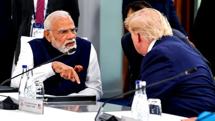 US President Donald Trump and Indian Prime Minister Narendra Modi amid debate over Russian energy purchases and US tariffs on India.