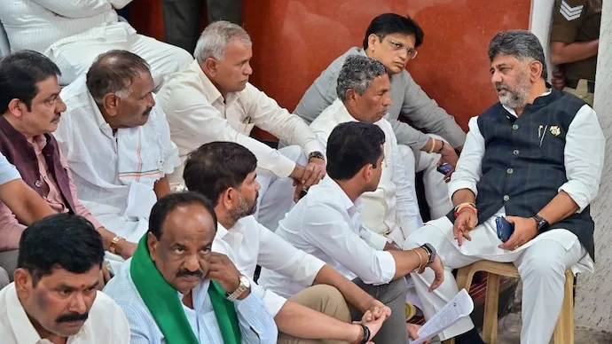DK Shivakumar and Karnataka ministers stage a sit-in at the Chief Electoral Officer’s office
