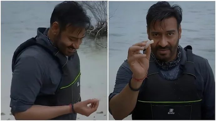 Ajay Devgn eating raw fish with Bear Grylls during Into The Wild