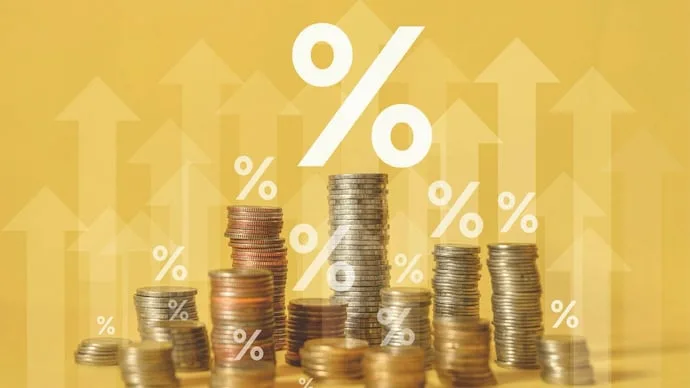 Bank buildings representing higher lending rates after the RBI repo rate hike